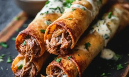 Cheesy Pulled Pork Taquitos with Chipotle Ranch Dressing: An Effortless Delight