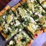 Green Pizza with Pesto, Feta, Artichokes, and Broccoli